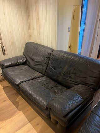 Conjunto de sofás de piel negro