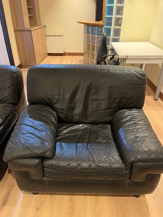 Conjunto de sofás de piel negro