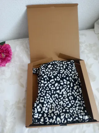 Pantalón a stampa animalier/ irrinunciabile. Taglia S