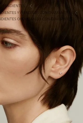 Pendiente oro blanco 18k con 3 diamantes