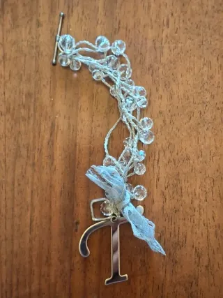 Braccialetto uncinetto con pendente T