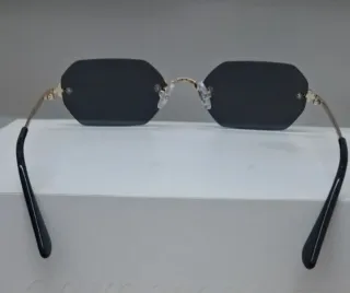 Occhiali da sole ottagonali grigio e oro