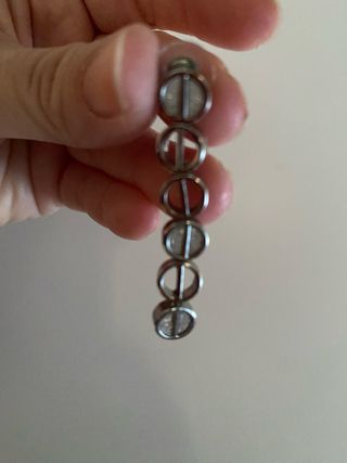 Pendientes plateados parfois lo