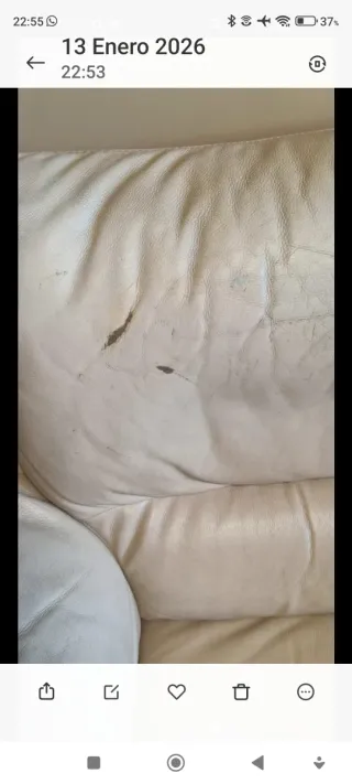 Sofá Natuzzi de piel beige