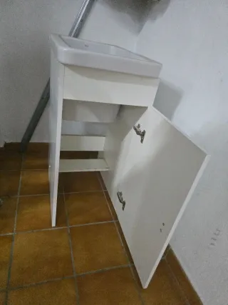 Pila de lavar con mueble