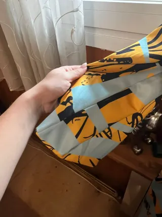 Gabardina vintage azul y amarilla precio algo nego