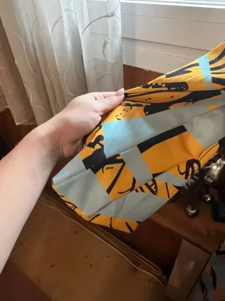 Gabardina vintage azul y amarilla precio algo nego