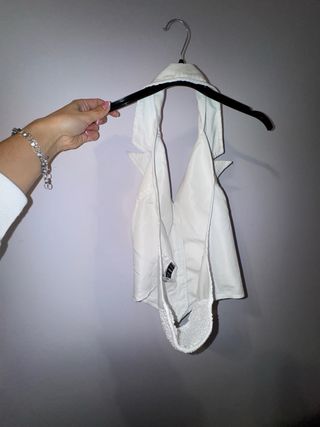 Chaleco blanco con botones espalda abierta