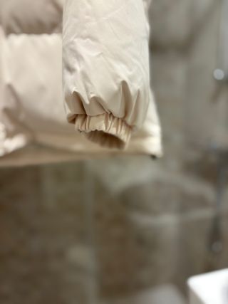 Plumífero con capucha mujer