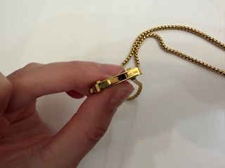 Reloj Guess Dorado y Negro Collar guess