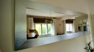 Espejo de pared plateado