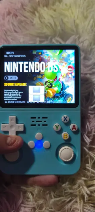 Consola,con muchísimos juegos antiguos