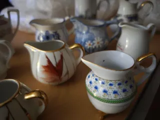 Juego de 9 jarritas de leche de cerámica