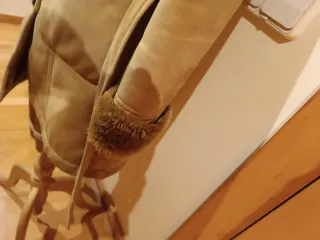 Abrigo beige con cinturón