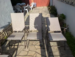 Sillas plegables exterior beige y marron