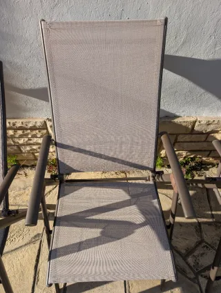 Sillas plegables exterior beige y marron