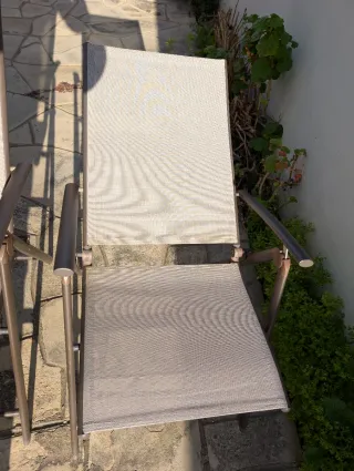 Sillas plegables exterior beige y marron