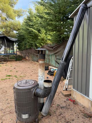 Estufa de leña metálica