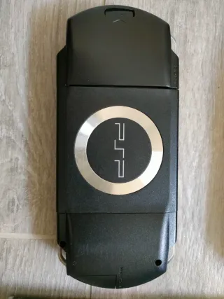 PSP - 1000 Sony con gioco e accessori - leggere