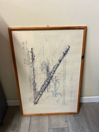 Quadro con flauto e spartito