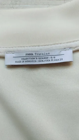 Sudadera blanca con cremallera