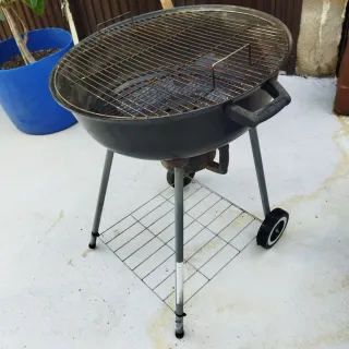 Barbacoa circular con ruedas