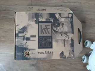 Patines blancos 4 ruedas de bota.