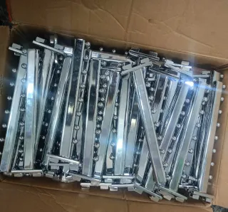 Cremalleras y ganchos para tienda metálicas