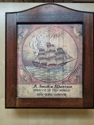 Cornice in legno con 4 stampe