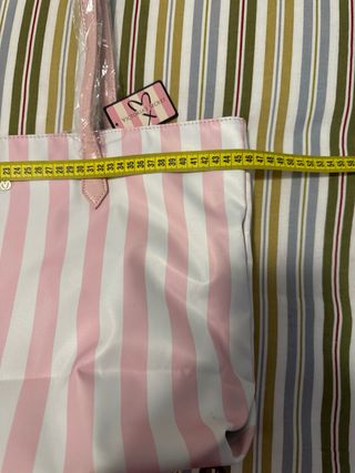 Bolso de rayas rosa y blanco