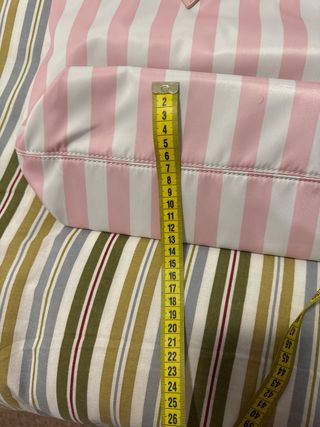 Bolso de rayas rosa y blanco