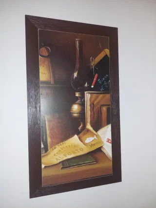 Quadri con cornice in legno