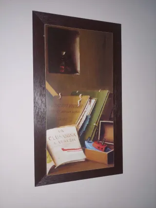 Quadri con cornice in legno