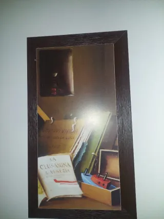 Quadri con cornice in legno