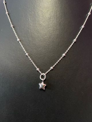 Collar de estrella plateada