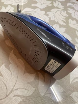 Plancha de vapor azul y blanca taurus