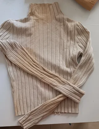 Jersey de cuello alto beige