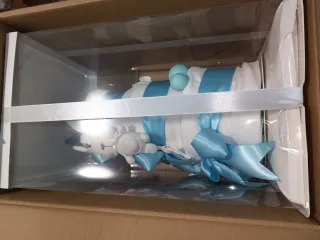 Tarta de pañales azul con peluche ✅