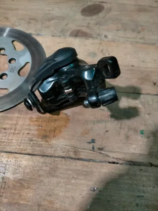 Patinete pinza de frenado