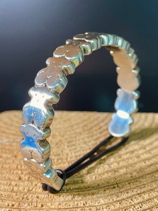 Pulsera de plata TOUS con ositos.