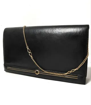 Bolso vintage negro cadena dorada