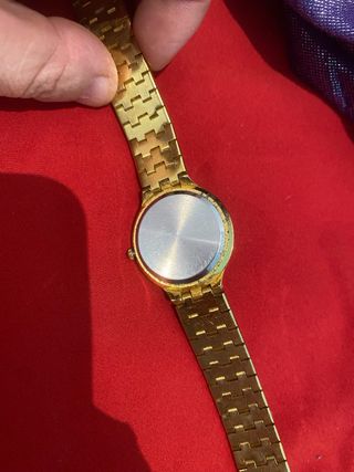 Orologio vintage dorato con drago