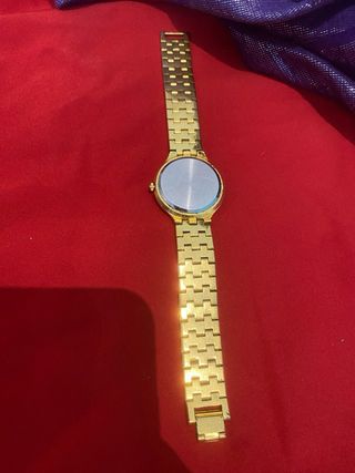 Orologio vintage dorato con drago