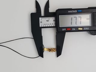 J-0782 Colgante patuco bebé 18K