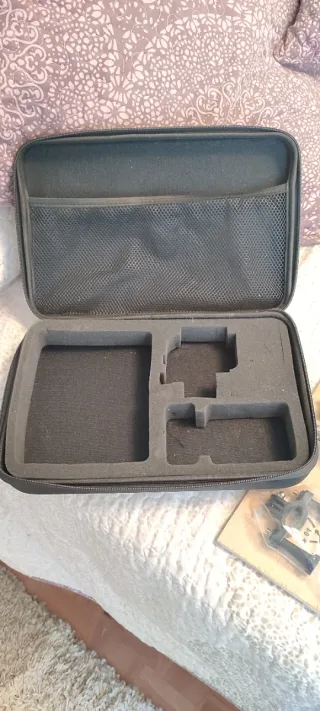 Accessori per fotocamera sportiva tipo GoPro con valigetta