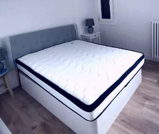 Canapé cama blanco con cabecero gris