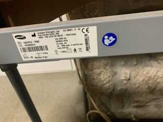 Cama elevable de madera y metal