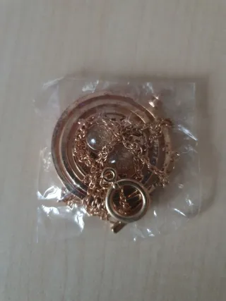 Colgante Giratiempos y moneda Gringots