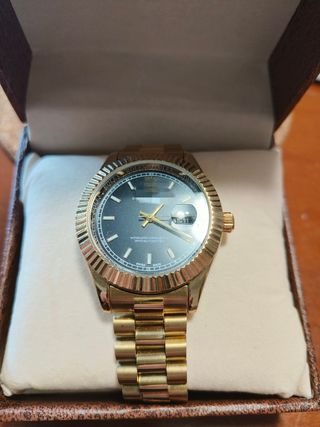 Orologio metallo colore Oro e Nero