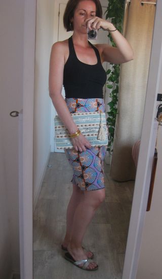 Pochette multicolor con detalles pailletados